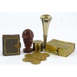 A group of miniature items, including a photo album, gilt-metal advertising tins, coin plaque, treen
