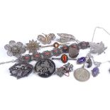 Various silver jewellery, including filigree brooches, St Christopher etc