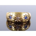 An 18ct gold 3-stone sapphire and diamond gypsy ring, maker's marks HW Ltd, band width 7.2mm, size