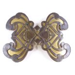 A Yves St Laurent late 1960s large Art Nouveau style belt buckle, gilded metal finish, length 130mm