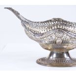 A late Victorian large silver table centre bon bon basket, with pierced surround, relief embossed