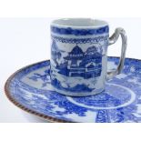 A Chinese blue and white porcelain plate, diameter 31cm, and a blue and white porcelain mug with