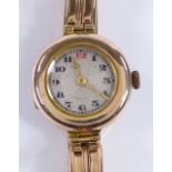 A lady's Vintage 9ct gold wristwatch, 15 jewel mechanical movement, on 9ct expanding strap, case no.