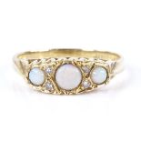 An 18ct 7-stone opal and diamond dress ring, setting height 5.3mm, size M, 2.9g