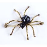 An unmarked gold and painted enamel figural spider brooch, length 46.2mm, 4.4g