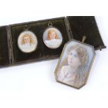 A pair of Victorian miniature watercolours on ivory, portraits of young girls, unsigned, with hair