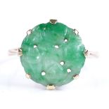 A 9ct gold carved jade panel ring, setting height 14.2mm, size R, 2.2g