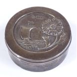 An Arts and Crafts circular silver box, presented to Admiral Sir William Edmund Goodenough, joined
