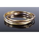 An 18ct gold Cartier Trinity bangle, in 3-tone gold, circa 1997, 1 bangle signed inside, marked