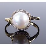 A 9ct gold whole pearl and diamond ring, setting height 11.3mm, size Q, 3g