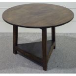 A circular oak cricket table, with triangular under tier, diameter 2' 7"