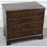 A 19th century mahogany chest of 2 short and 3 long drawers, original brass drop handles and bracket
