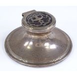 A silver and tortoiseshell picquet inlaid Capstan inkwell, height 4.5cm (hallmarks rubbed)