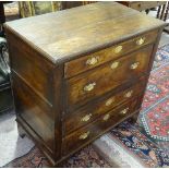 An 18th century walnut chest of drawers, brass drop handles, on bracket feet,