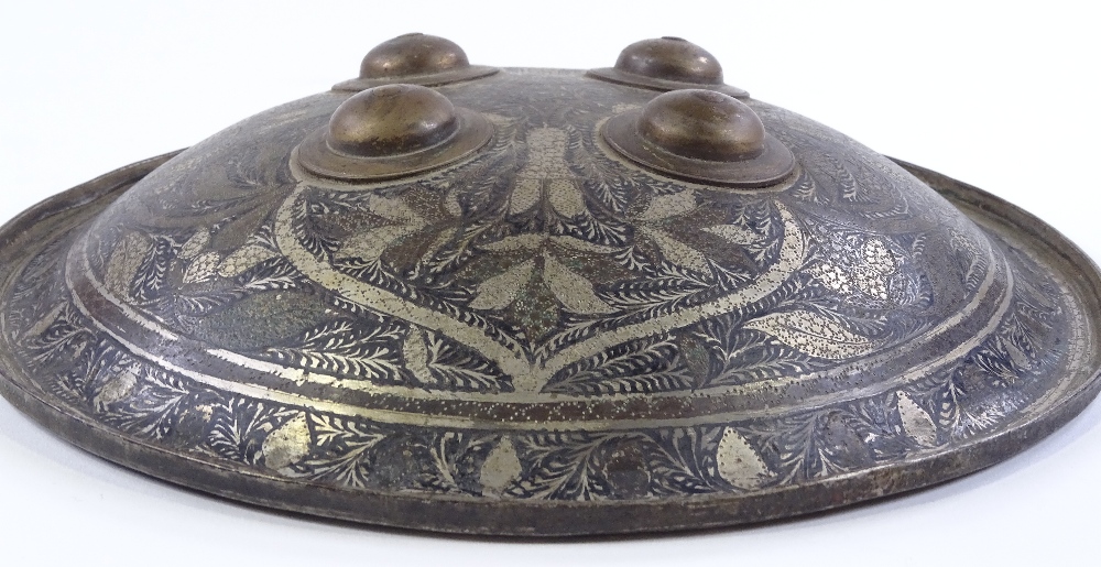 A 19th century Islamic metal shield, with inlaid floral decoration and brass bosses, diameter 26cm - Image 3 of 4