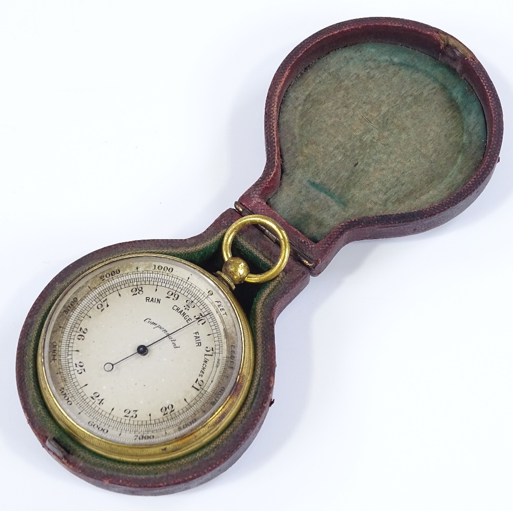 A 19th century pocket barometer, with silvered dial, gilt-metal case, in original red leather - Image 2 of 3