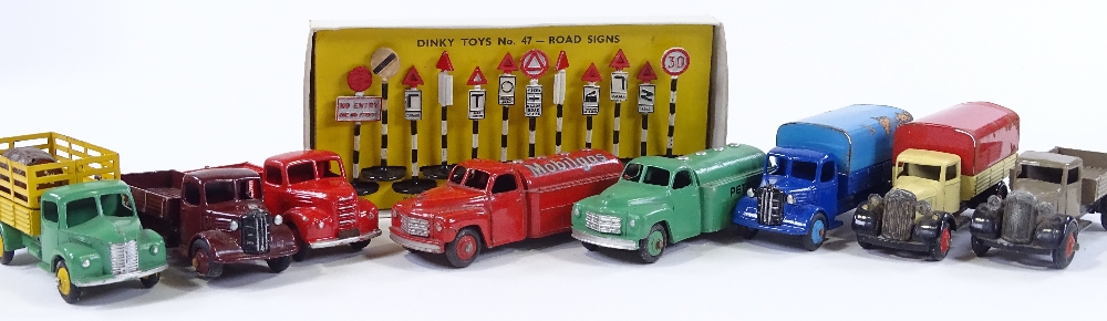 Dinky Meccano, 8 unboxed trucks and sets of boxed road signs 47