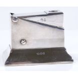 A George V silver push-down desk cigar cutter, hallmarks London 1919, length 7.5cm