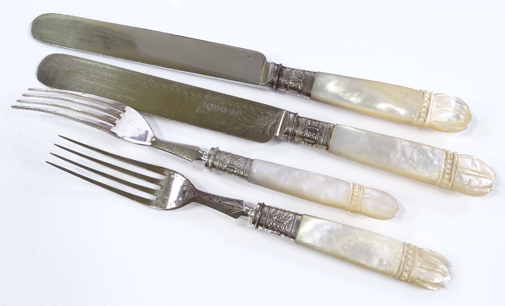 A cased set of Victorian carved mother-of-pearl handled dessert knives and forks for 12 people ( - Image 3 of 3