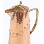 A WMF Arts and Crafts copper jug of tapered circular form, with rivet decoration, height 21cm