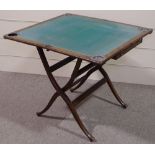 A Victorian mahogany Campaign games table, with nickel plate counter wells, and 2 drawers, width