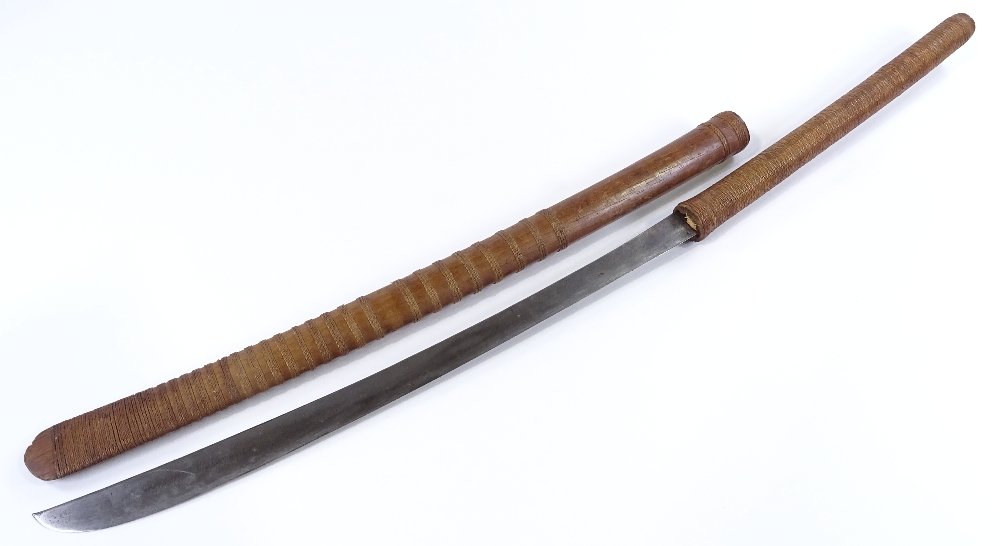 An Antique Japanese sword, with straw-bound handle and original and original straw-bound wood - Image 2 of 3