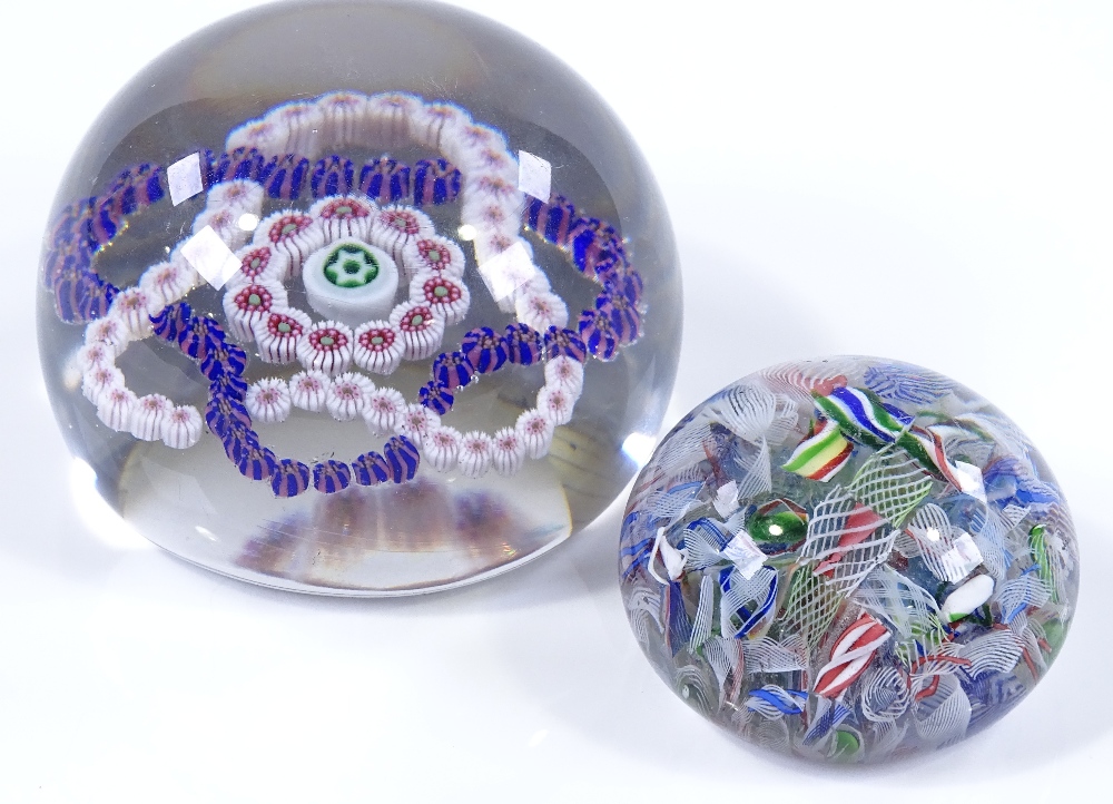 A St Louis glass paperweight with millefiori garland interwoven design, diameter 7cm, and a