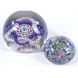 A St Louis glass paperweight with millefiori garland interwoven design, diameter 7cm, and a
