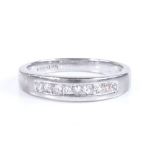 A platinum and diamond half eternity ring, band width 3.9mm, size L, 3.8g