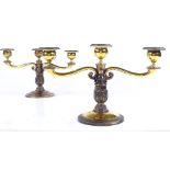 A pair of sterling silver gilt 2-branch candelabra, with removable fittings, with warthog above W