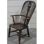 An elm-seated bow-arm Windsor chair