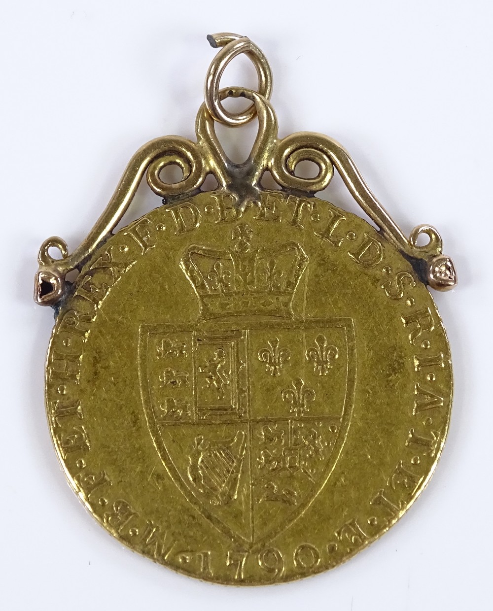 A George III 1790 gold Guinea, with gold pendant mount