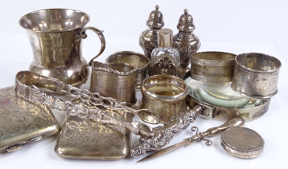 Various silver items, including a thistle shaped mug, a curved cigarette case, napkin rings etc, - Image 3 of 3