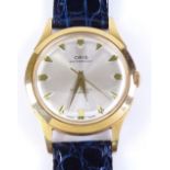 An Oris Mechanical wristwatch, with 17 jewel movement and gold plated case, on blue leather Oris