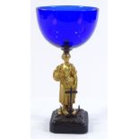 A 19th century Bristol blue glass bowl, supported by a gilt-bronze Classical figure beside an