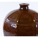 A Chinese Song style dark brown glaze porcelain vase, relief moulded floral decoration with koi
