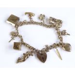 A 9ct gold curb link charm bracelet, set with 10 charms, 25g