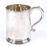 A silver pint mug, of plain cylindrical form, by Goldsmiths & Silversmiths Co Ltd, hallmarks