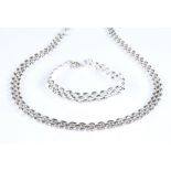 A stylised sterling silver necklace and bracelet set, necklace length 420mm, bracelet length