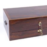 A large Georgian rosewood work-box, with inlaid tulip wood cross-banding and drawer under, length