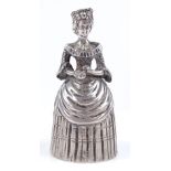 A Continental silver novelty hand bell, in the form of a lady, height 9.5cm