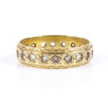 An 18ct gold paste eternity ring, band width 4.8mm, size M, 2.9g (1 stone missing)