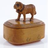 A small Black Forest carved wood box surmounted by a dog, length 6cm