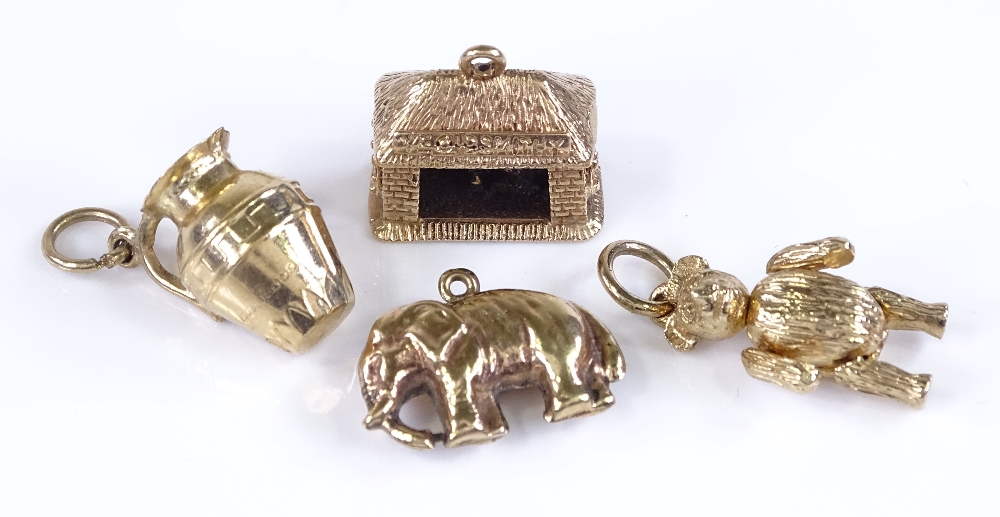 4 9ct gold charms, including elephant and teddy bear, 6.9g