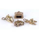4 9ct gold charms, including elephant and teddy bear, 6.9g