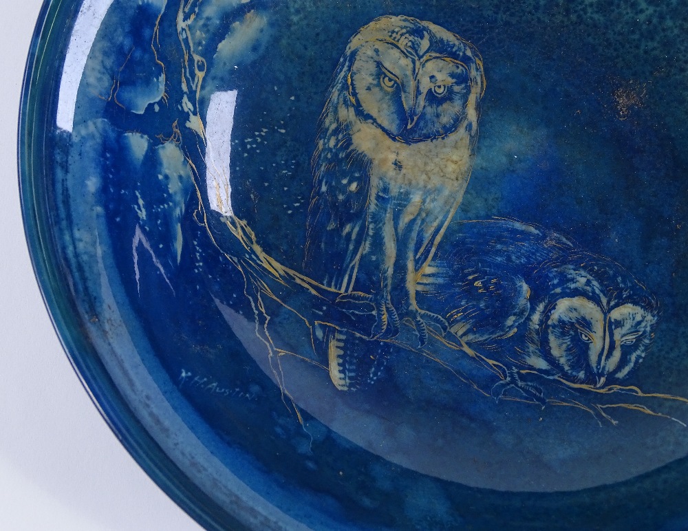 A Royal Worcester Sabrina pottery bowl, with gilded owl designs, signed K H Austin, serial no. 2769,