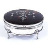 An Edwardian oval silver and tortoiseshell picquet inlaid jewel box, by E S Barnsley & Co, hallmarks