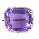 A large step-cut amethyst brooch, unmarked gold settings, length 19.9mm, 6.9g