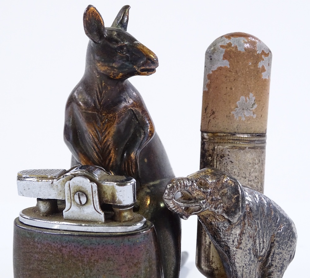 A novelty kangaroo design table lighter, height 9cm, and an electroplate elephant design table - Image 3 of 3