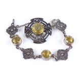 A Scottish silver citrine set bracelet and brooch, 26.8g (2)
